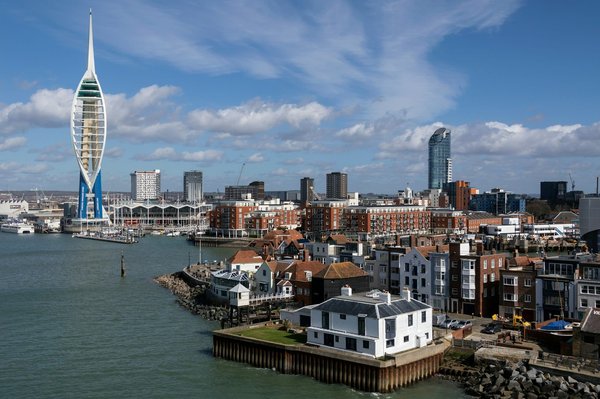 Where can tourists attend in-depth explorations of 18th-century naval warfare in Portsmouth?