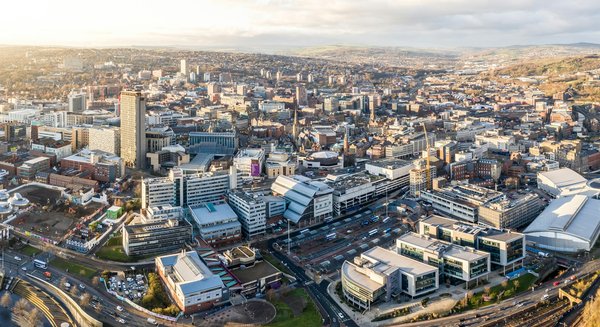 What are the best locations for learning about the impact of the Industrial Revolution in Sheffield?
