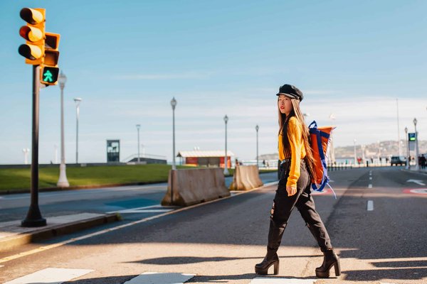 How can tourists participate in authentic Bronze Age metalworking workshops in Wales?